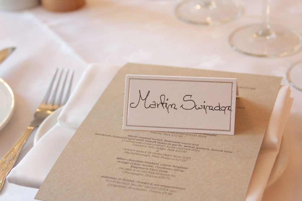 Place setting with bespoke menu and personalised name card