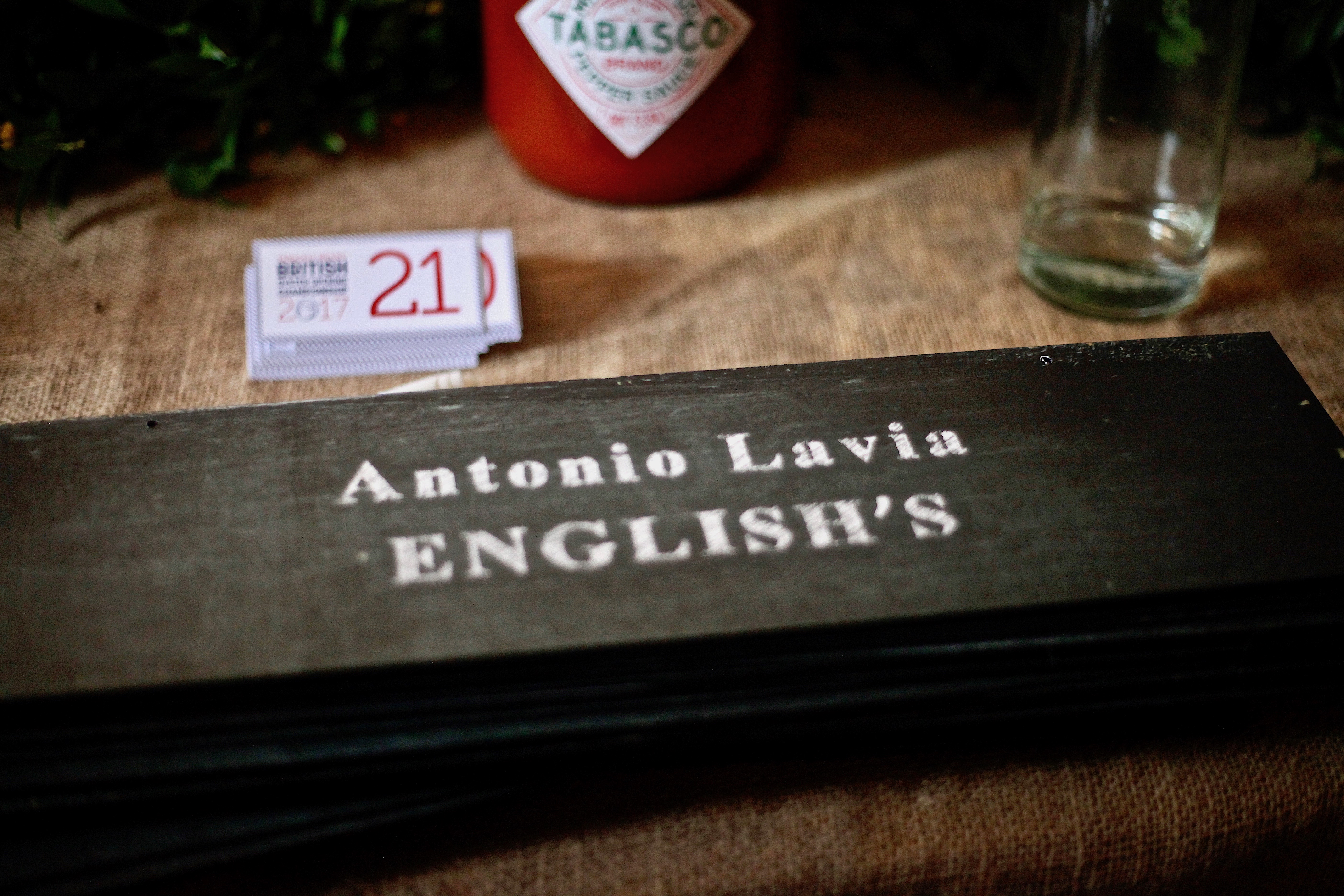 Antonio Lavia from English's sign, to be hung in front of his shucking station