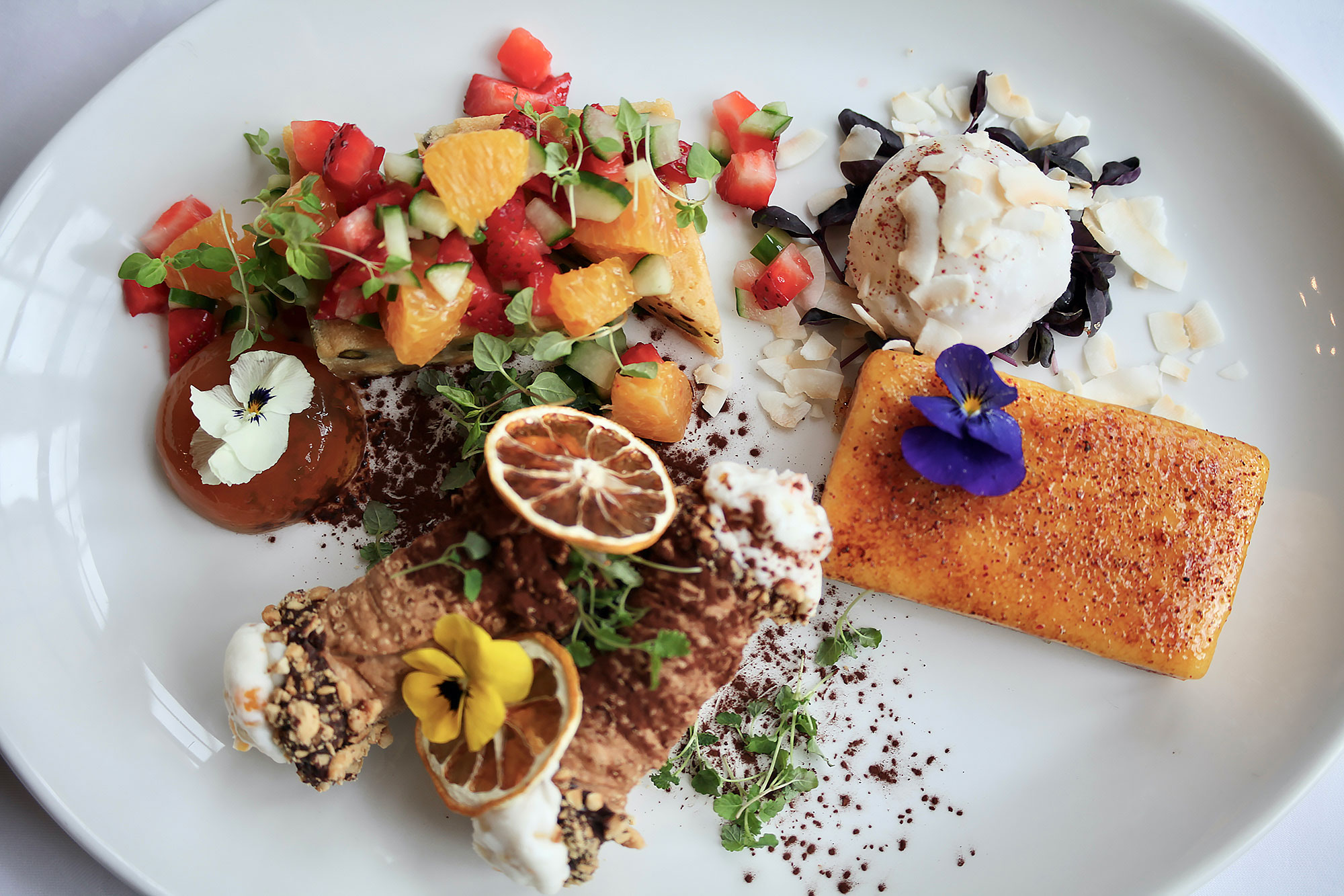 To finish: A sharing platter of course! 1. Sicilian cannoli, ricotta, gianduja, candied lemon 2. White chocolate and pistachio brownie, Pimm’s jelly strawberries, cucumber, orange, mint 3. Caramelized passion fruit tart, coconut sorbet, pink peppercorn, basil.