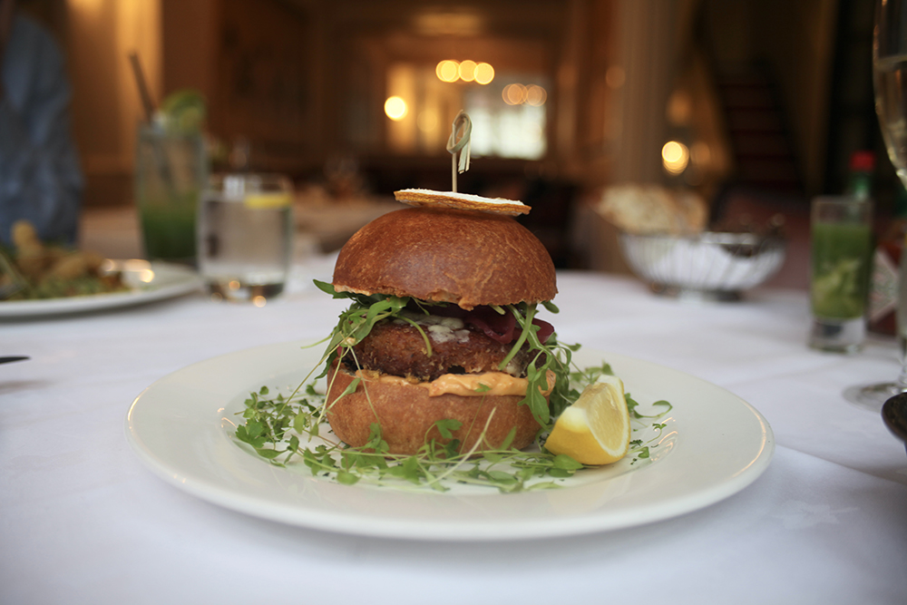 Burger, brioche bun, cannellini beans patty, matured cheddar, tapenade, pickled onions, sundried tomato mayonnaise, rocket V