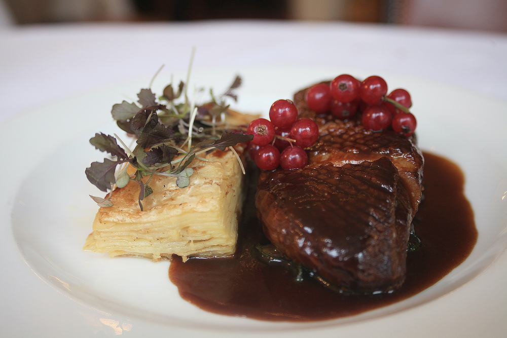 Goose breast, celeriac dauphinoise, wilted spinach, red currant, cider demi-glace